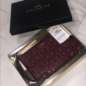 Burgundy Coach wristlet wallet🤩